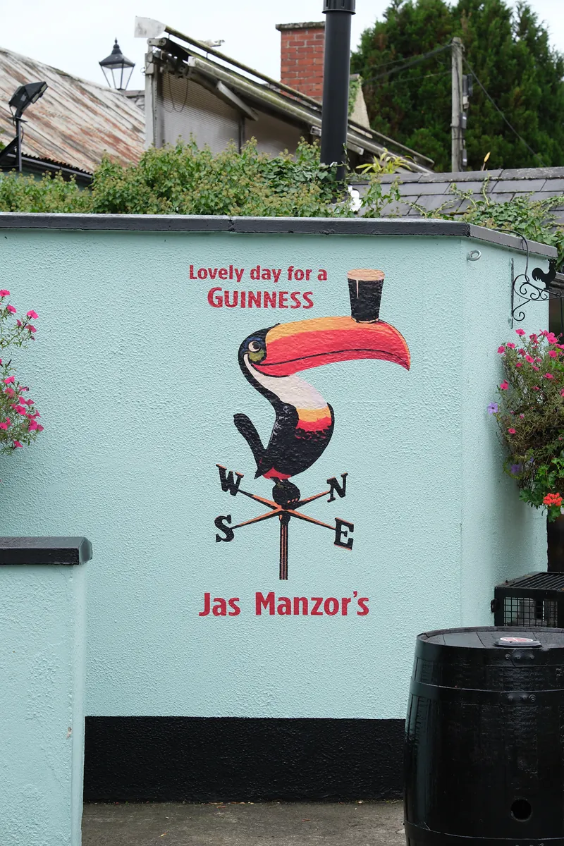 A painted mural of the Guinness toucan on a weathervane: Lovely day for a Guinness, Jas Manzor’s